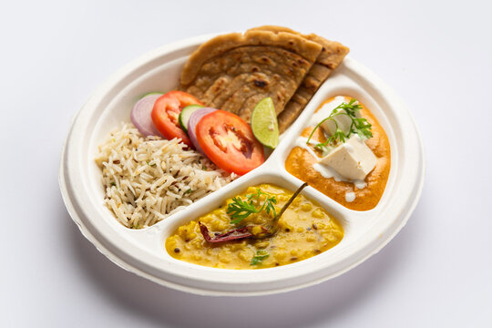 North Indian mini meal, parcel platter or combo thali with paneer butter masala, roti, dal and rice