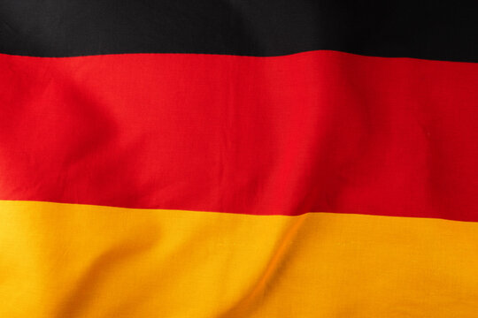 Image of close up of wrinkled national flag of germany
