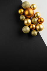 Composition of close up of new years baubles on gray background