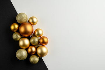 Composition of close up of new years baubles on white background