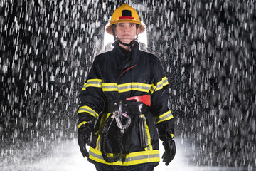 Portrait of a female firefighter standing and walking brave and optimistic.