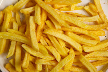 Golden potato chips french fries fast food from above