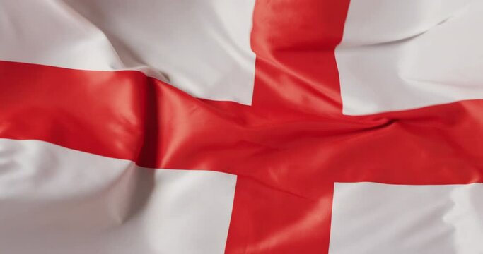 Animation of football over flag of england with copy space
