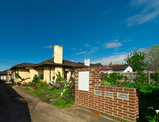 Fototapeta na wymiar Brick Veneer town houses in suburban Melbourne Victoria Australian Suburbia Urban Living