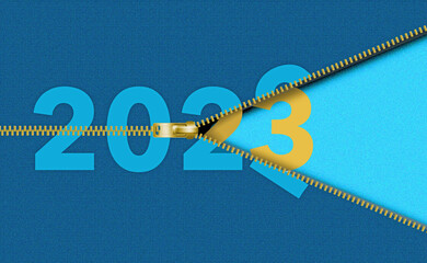 The new year 2023 is unzipped and exposed from beneath the number 2022 in a 3-d illustration. © Rob Goebel