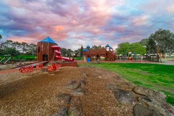 Papier Peint photo Destinations beautiful Children’s park playground in Suburban Melbourne Victoria Australia. Lovely green grass and nice sunset colours in the sky