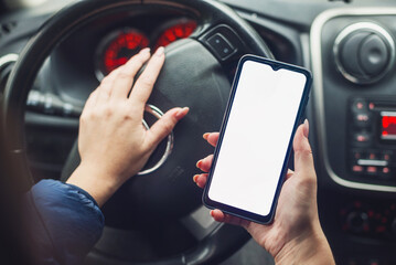 woman driving with phone
