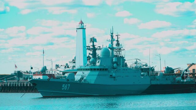 A military cruiser in port