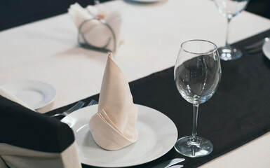Banquet table with wineglasses. High angle of elegant banquet table served for wedding celebration