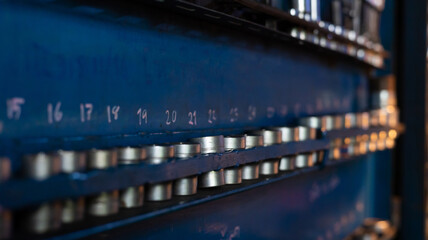 Workshop scene. Tools  and wrenches close-up on the wall board.