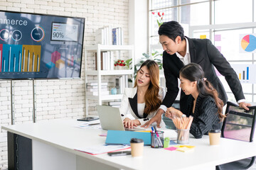 Professional Asian business adviser meeting to analyze and discuss the strategy of financial...