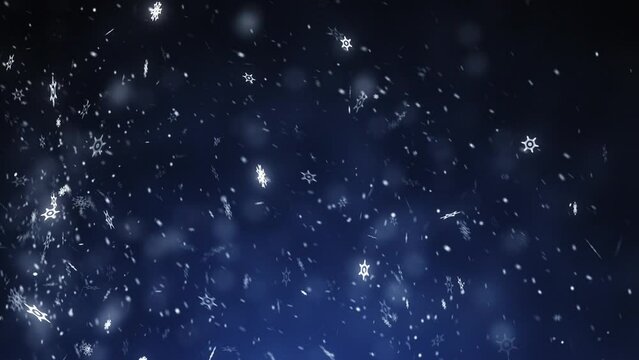 Many white snowflakes falling down on a dark blue background.