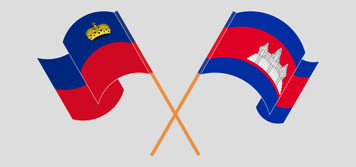 Crossed and waving flags of Liechtenstein and Cambodia