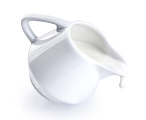  Ceramic milk jar, pot, jug isolated on white background. Milk flowing from a jug. With clipping path.