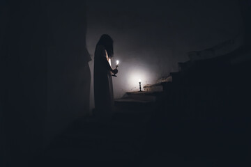 Obraz na płótnie Canvas Scary ghost woman in haunted house