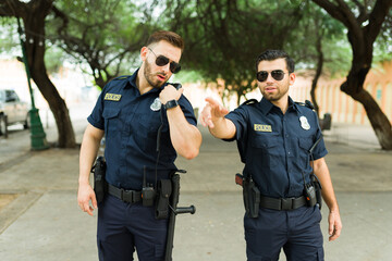 Busy police agents reporting a crime