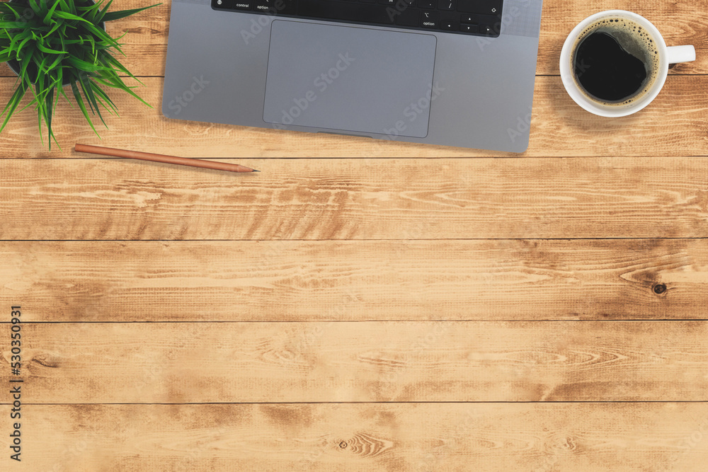 Poster Flat lay of top view desk work table with computer notebook and pencil work space on wood background includes copyspace for add text or graphic