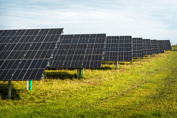 Renewable energy from solar panels in a solar park to generate clean energy.