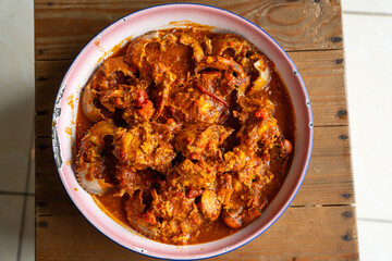 Baby Crab sauce padang (Indonesian Kepiting Saus Padang). dish of crab served in hot and spicy Padang sauce. 