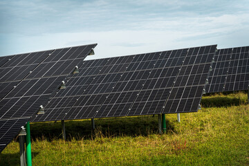 Renewable energy from solar panels in a solar park to generate clean energy.