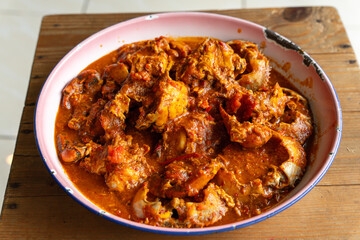 Baby Crab sauce padang (Indonesian Kepiting Saus Padang). dish of crab served in hot and spicy Padang sauce. 