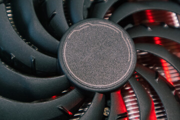 Cooler fan on Gpu graphics card close-up in red