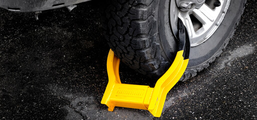 Wheel Boot or Tire Lock for Illegal Parking Violation Immobilize Vehicle Car