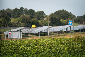 Generating clean energy with solar panels in a large park in Germany Bavaria. Renewable energy through solar panels to generate clean energy.