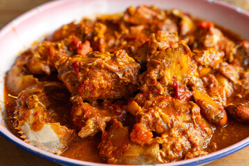 Baby Crab sauce padang (Indonesian Kepiting Saus Padang). dish of crab served in hot and spicy Padang sauce. 