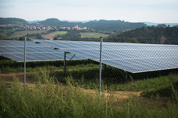 Generating clean energy with solar panels in a large park in Germany Bavaria. Renewable energy through solar panels to generate clean energy.