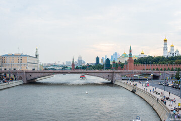Fototapeta na wymiar View of the Moscow Kremlin on the bank of the Moscow river. Cityscape of Moscow. Summer 2022
