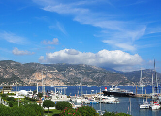 SAINT-JEAN-CAP-FERRAT, FRANCE - SEPTEMBER 2019: Yachts in port of Saint-Jean-Cap-Ferrat - resort and commune in southeast of France on promontory of Cote d'Azur in Provence-Alpes-Cote d'Azur, France