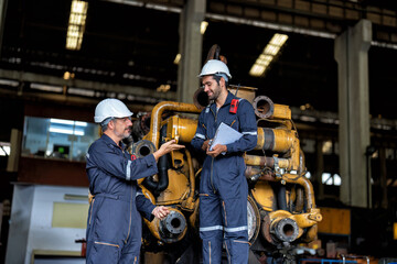 In heavy industry maintenance manager meet engineer checking and agreement hand check and sign on...