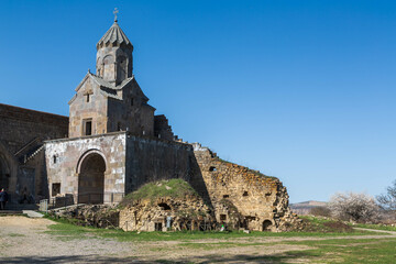 Fototapeta na wymiar Tatev, Armenia. Aerial view of 9th-century Armenian Apostolic monastery located near the Tatev village in Armenia. St Astvatsatsin church