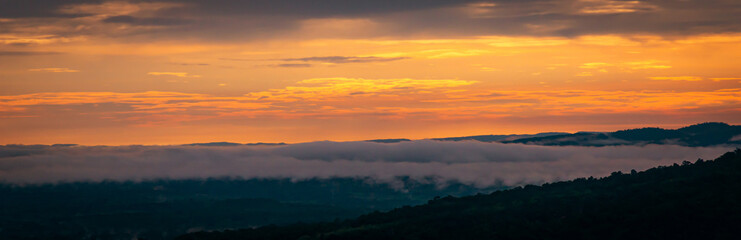Amazing sunset and sunrise.Very beautiful of morning light, fluffy mist, over the valley.select focus.