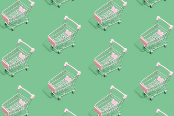 Pattern of supermarket shopping cart on green background. Creative design for packaging. Online...