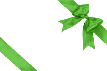 Shiny green satin ribbon with bow isolated on a transparent background.