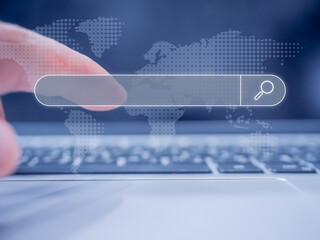 Using a computer keyboard to Searching for information. Searching information data on internet...