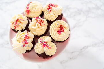 Red Velvet Cupcakes with White Chocolate Ganache Frosting