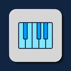 Filled outline Music synthesizer icon isolated on blue background. Electronic piano. Vector