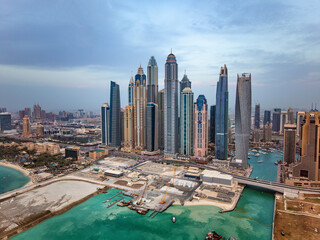 Fototapeta premium Aerial view of Dubai city coastal development UAE