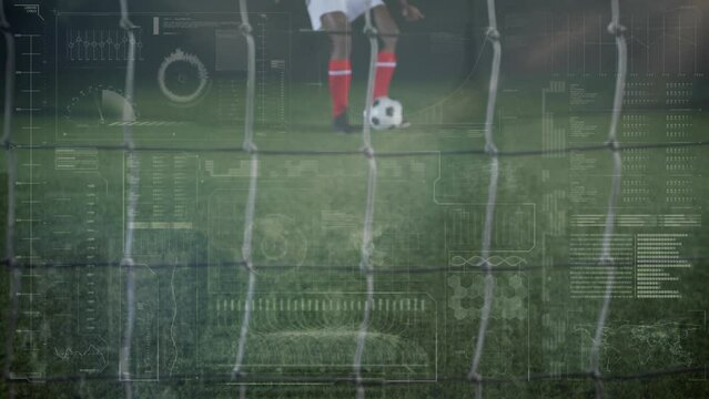 Animation of interface over soccer player kicking ball towards nets and goalkeeper defending goal