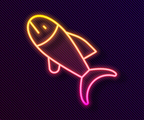 Glowing neon line Fish icon isolated on black background. Vector