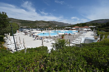 Fototapeta na wymiar Pool area at a hotel in Croatia during Sept 2022. 