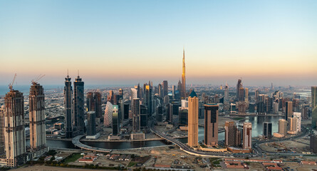 Aerial sunset view of Dubai city skyscrapers UAE