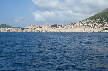 The outer walls of the old walled town of Dubrovnik at Dalmatia in Croatia from the sea. 