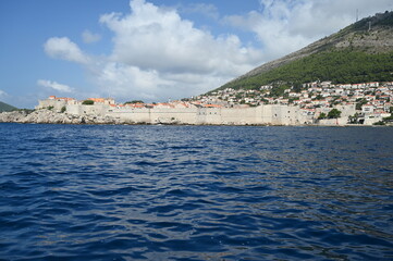 The outer walls of the old walled town of Dubrovnik at Dalmatia in Croatia from the sea. 