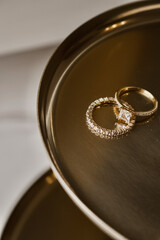 wedding women's rings on a gold background