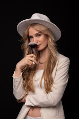 girl in a white fashionable suit with white beautiful hair