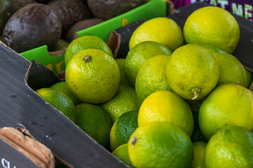 Green lime fruits on market